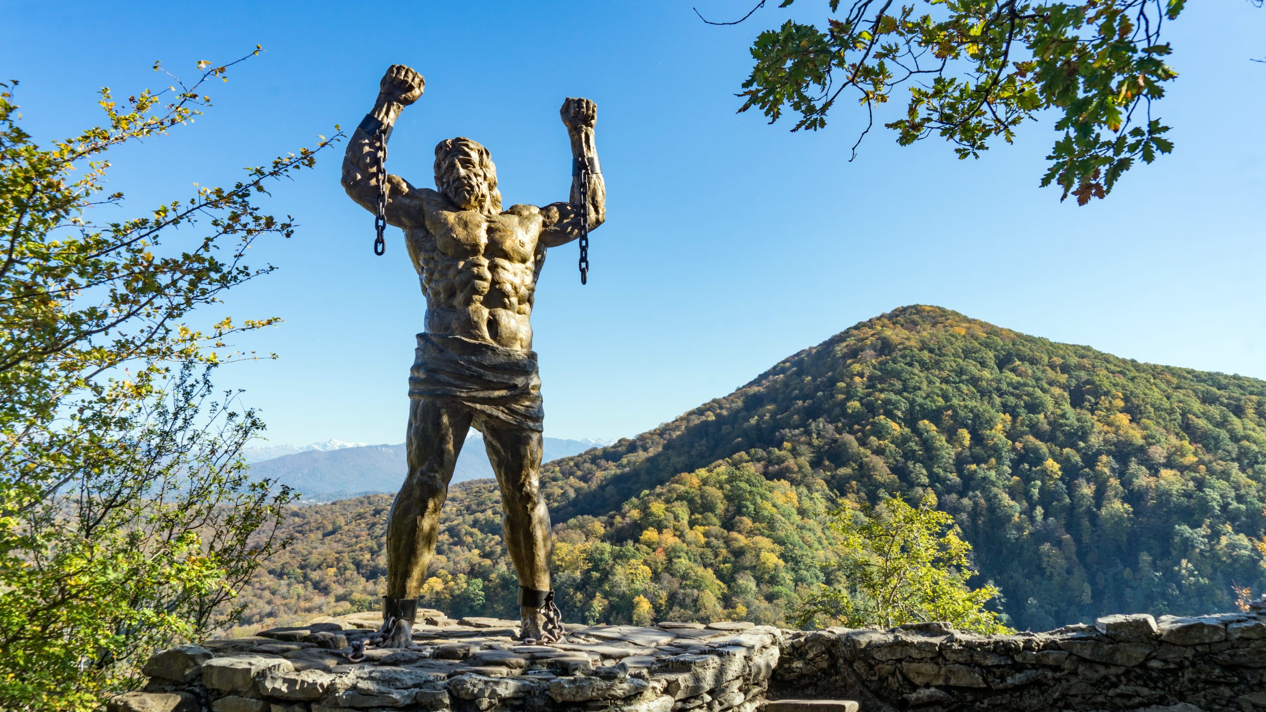 Prometheus sculpture on the backgroung of Ahun mountain, Sochi, Russia