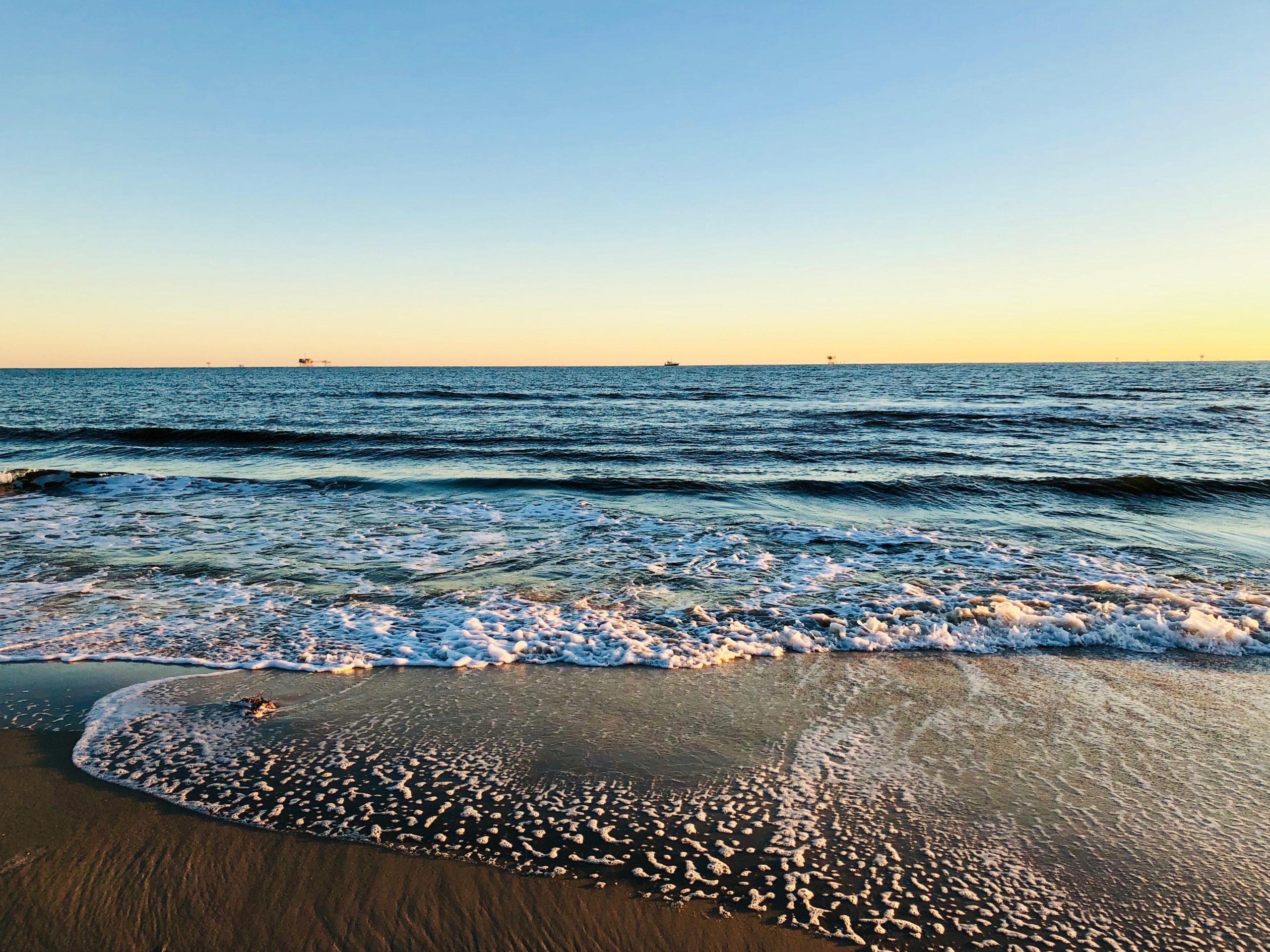 scenic-view-sea-against-clear-sky