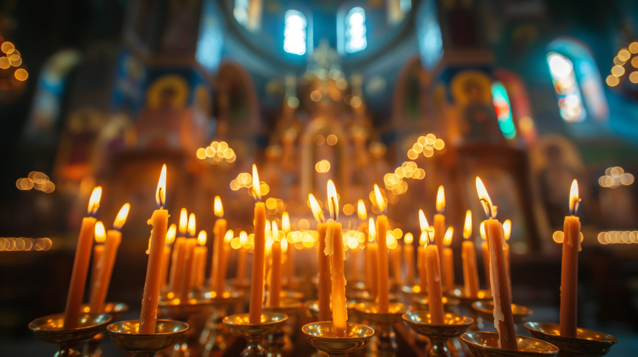 burning candles, the concept of christian religion, orthodox church background, soft focus